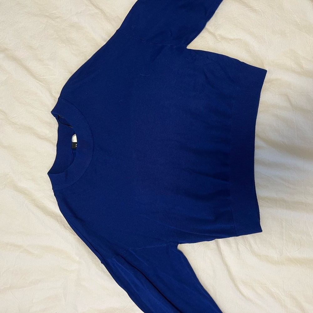 Divided blue sweater
